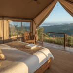 "Glamping Tent in Indonesia Surrounded by Lush Greenery with Mountain View at Sunset"